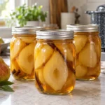 Sealed jars of Brandied Pears prepared using the tested Bernardin method