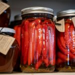 Pickled hot peppers in glass jars