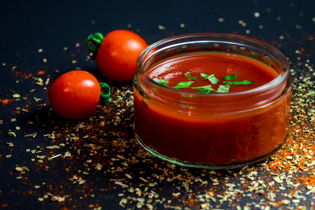 Thick homemade tomato paste prepared for home canning